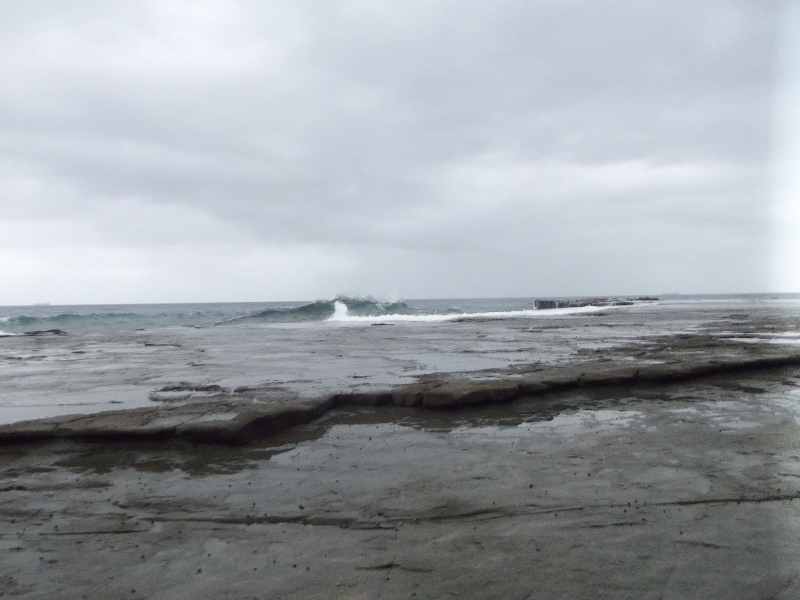 Wave about to break on rocks